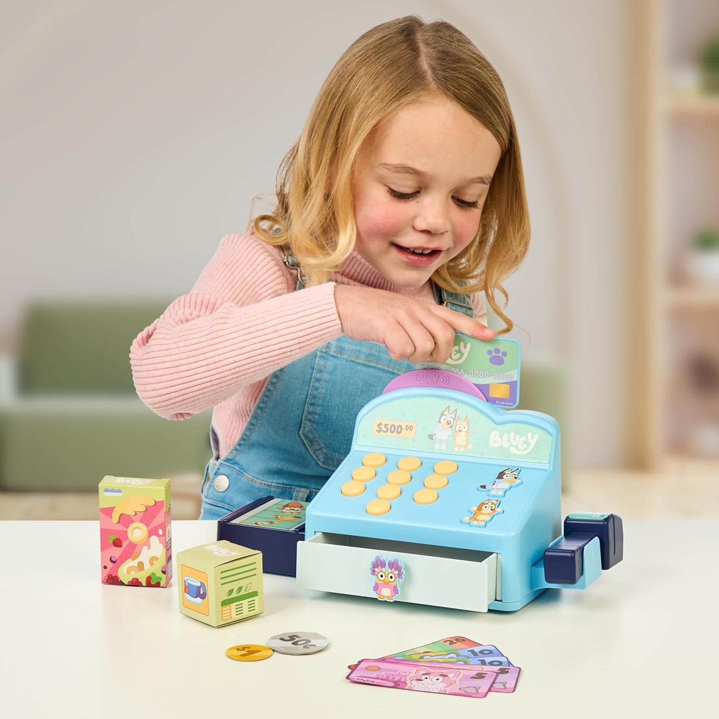 Cash Register. Press the Buttons to Hear Beeps, Sounds and Phrases from  and Bingo |Use the Scanner to Scan Packages and Pretend to Run a Shop | Includes Toy Credit Card and Dollar Bucks!